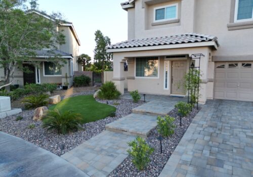 A house with a lot of landscaping in it